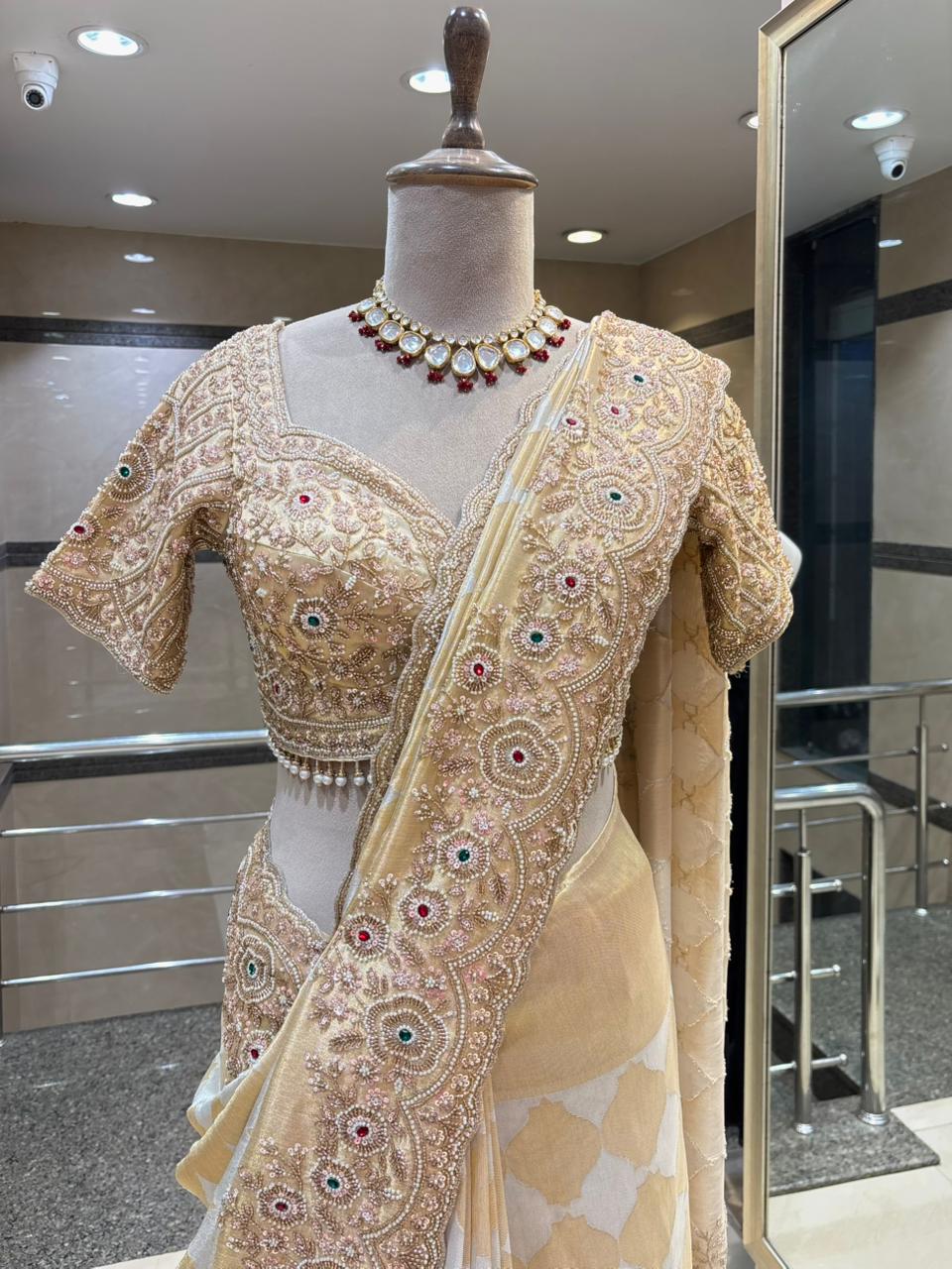 Royal Ivory & Golden Luxury Designer Saree with Pearl, Zari, Sequins, Cutdana, Beads, Embroidery Work Saree with Readymade Blouse (SC23112)