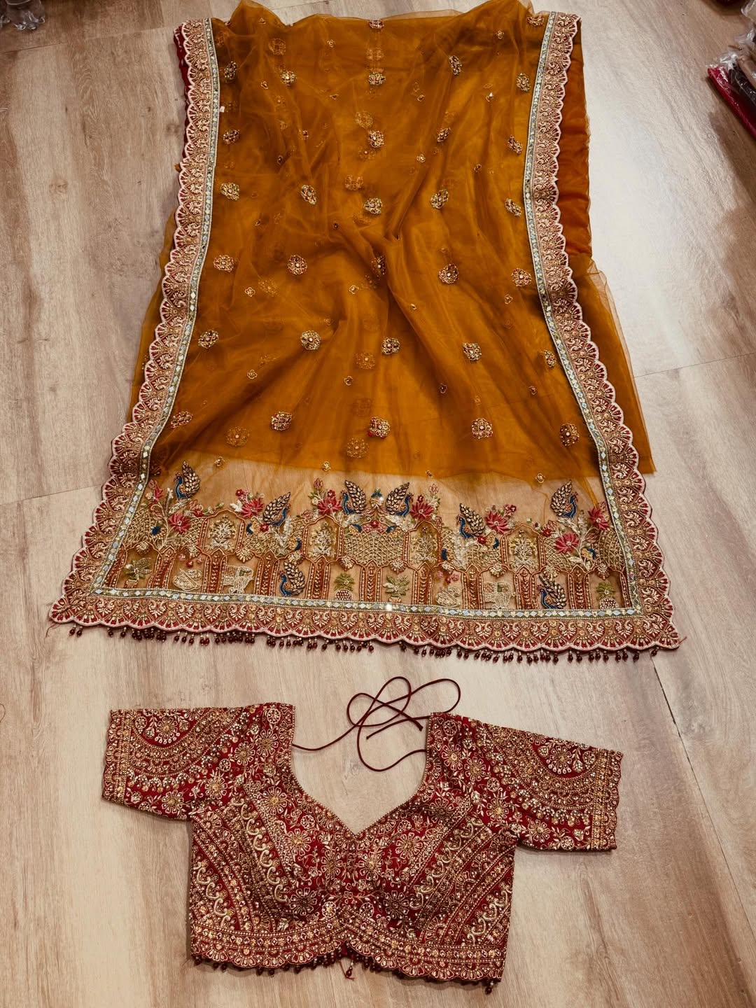 Rajwadi Luxury Cinnamon Net Saree with zari, sequins and stone work, intricately woven into rich motifs and Fully Stitched Readymade Embroidered Blouse (SC77555) - Image 5