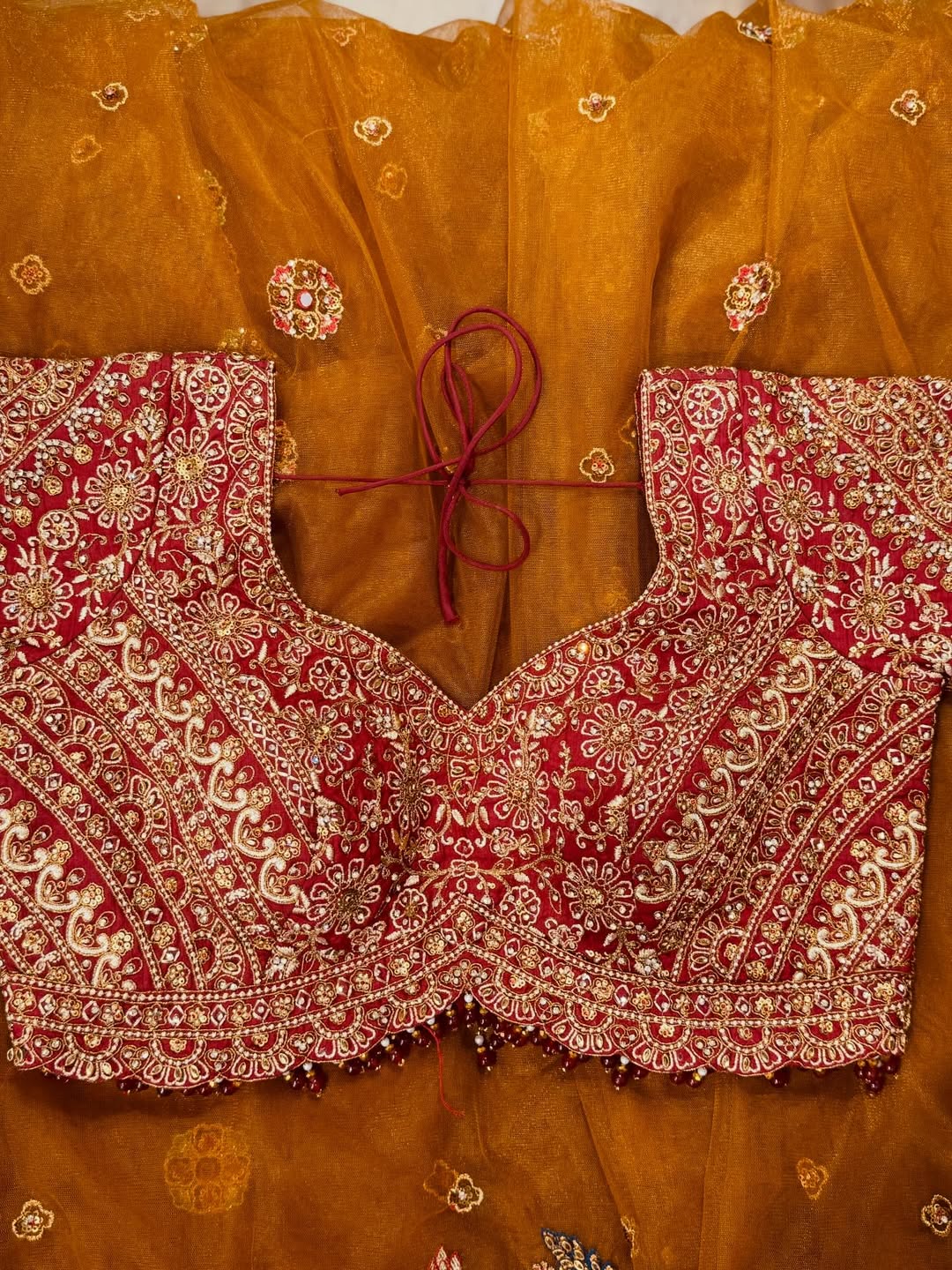 Rajwadi Luxury Cinnamon Net Saree with zari, sequins and stone work, intricately woven into rich motifs and Fully Stitched Readymade Embroidered Blouse (SC77555) - Image 4